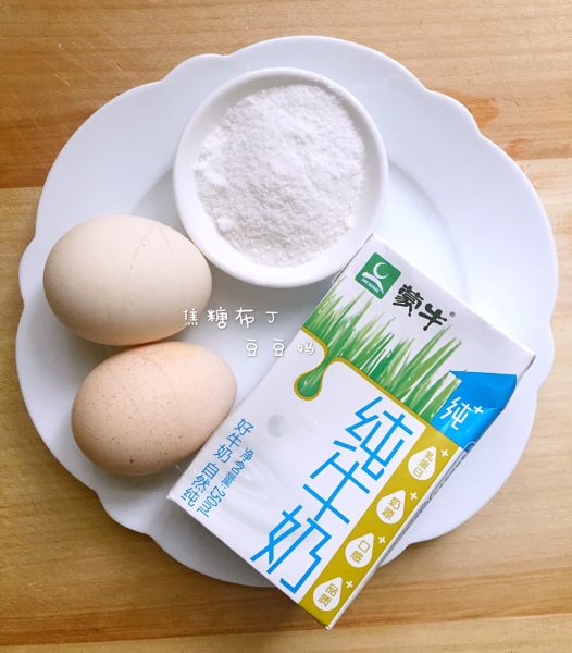 焦糖布丁的做法操作步骤第1步：鸡蛋、牛奶、糖粉、柠檬汁
